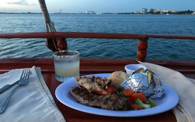 Cancun Lagoon Sunset Sailing Trip aboard classic Galeón with Dinner and Free bar photo 6