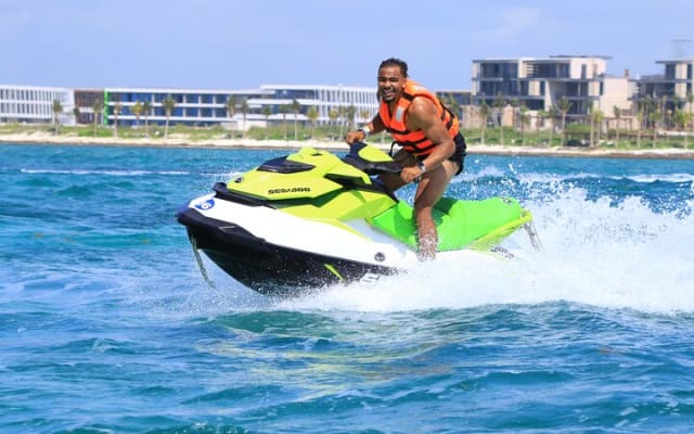 Drive a Waverunner in the beautiful Maroma Beach with transport photo 2