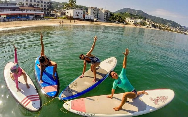 Clase de yoga SUP los jueves por la mañana en el mar en Puerto Vallarta photo 4
