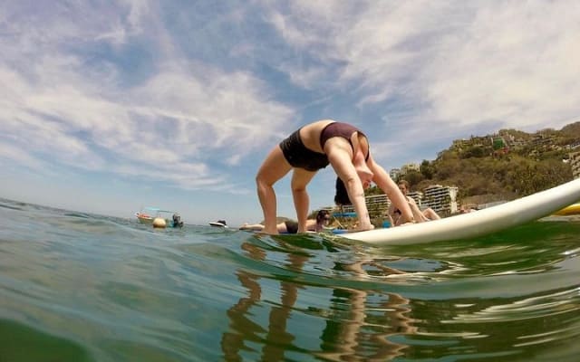 Clase de yoga SUP los jueves por la mañana en el mar en Puerto Vallarta photo 2