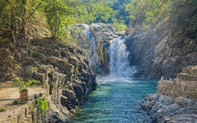 Authentic Local Experience in Quimixed Boat Tour and Waterfall