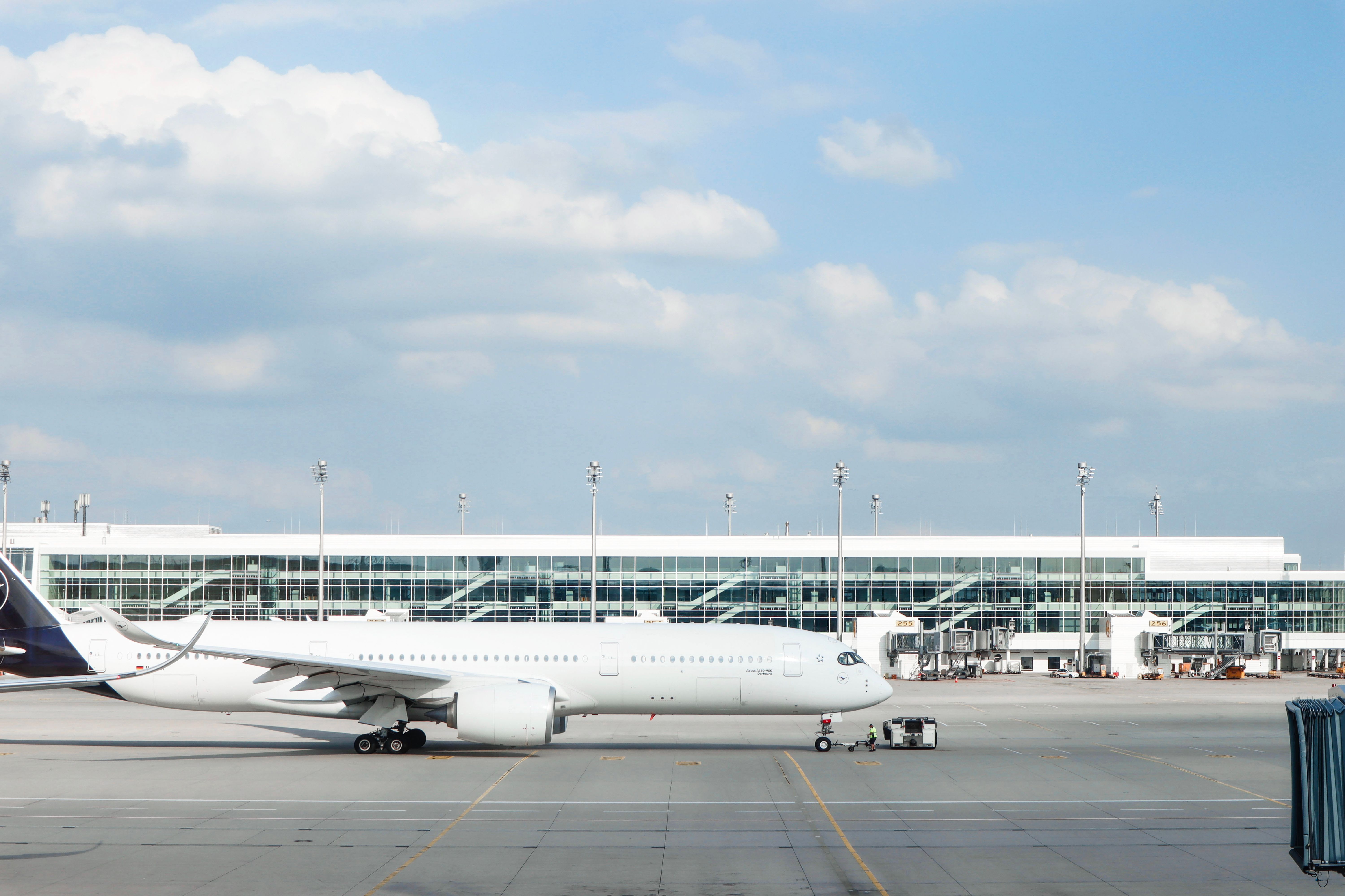 Commercial airplane on a tarmac at a Mexican airport terminal — flights from Mexico City to the Tulum area take just under two hours