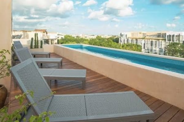 Spectacular Tulum Retreat: Rooftop Pool, BBQ & Beach Club Access! 1BR Oasis