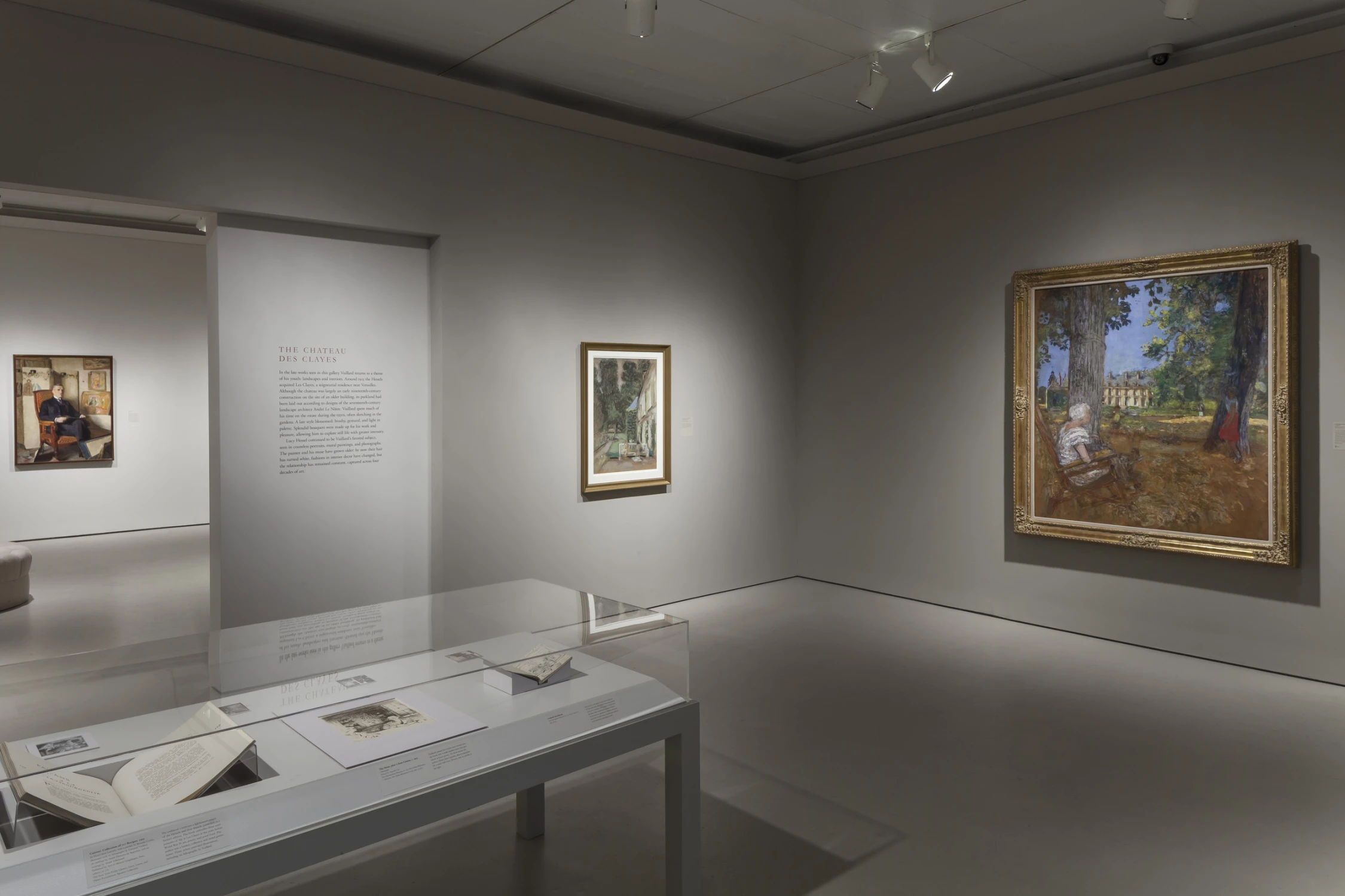 display, books, paintings, gray