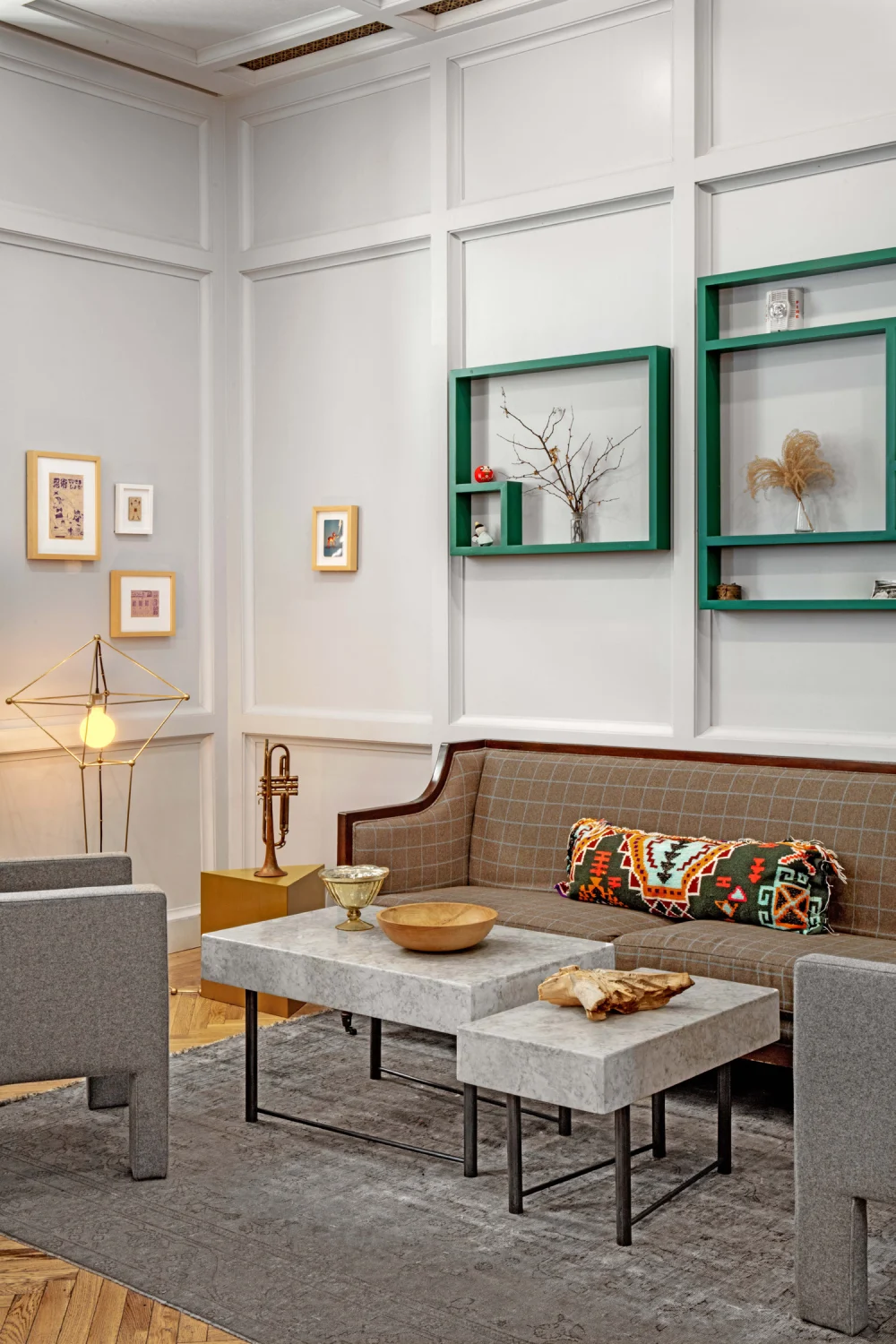wall panelling, sofa, coffee table, art