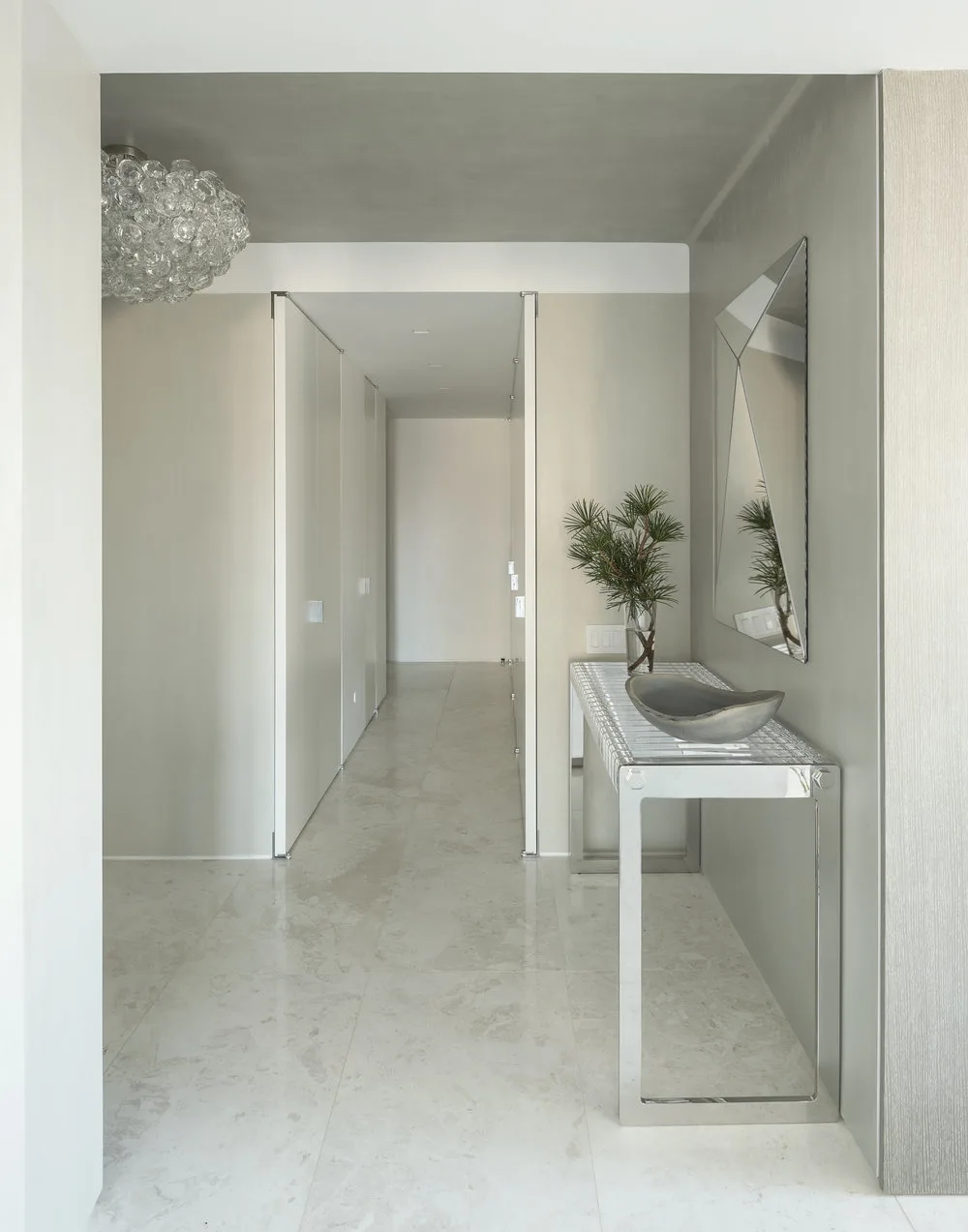 FOYER, side table, mirror, hallway, chandelier, metal frame, stone flooring