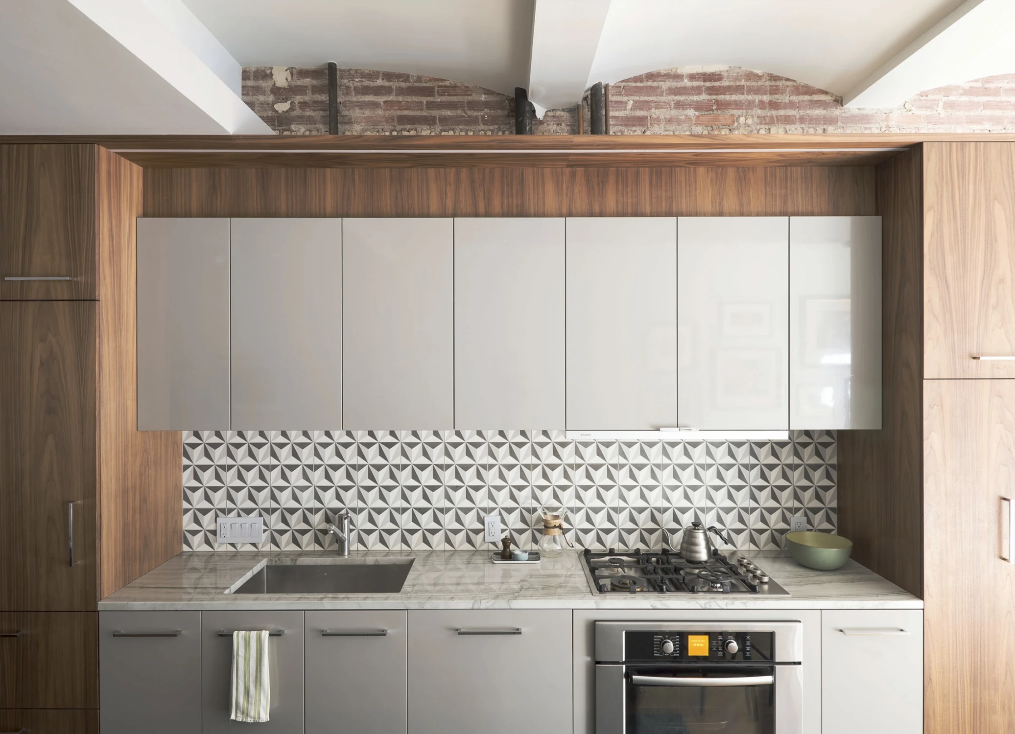 kitchen, counter, cabinets, tile,brick,arch, wood, steel,towel,sink