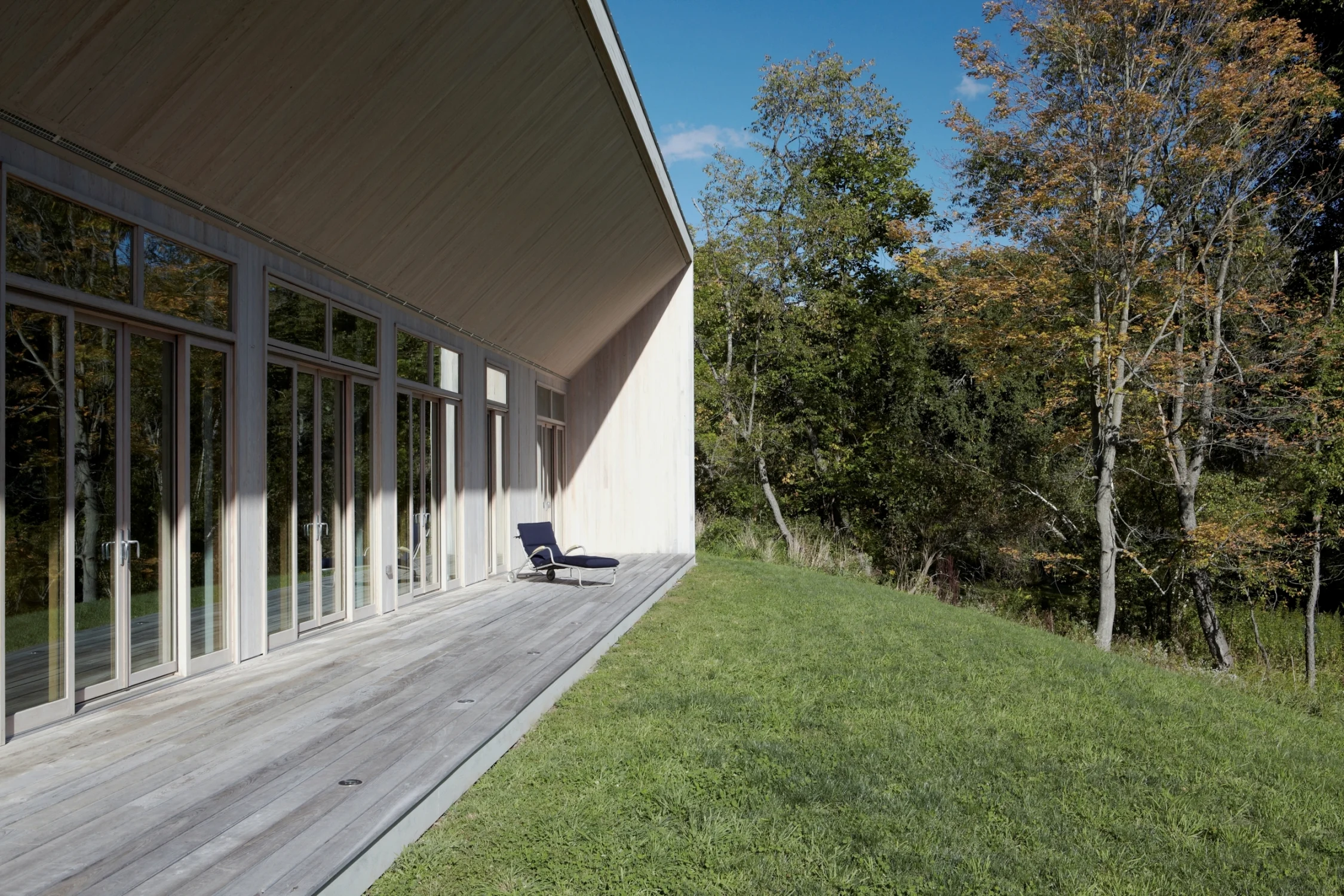 DECK, lawn, trees, glass doors