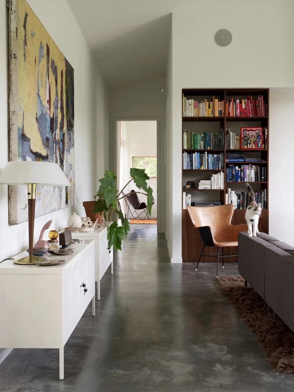 CORRIDOR, side table, art, bookshelves