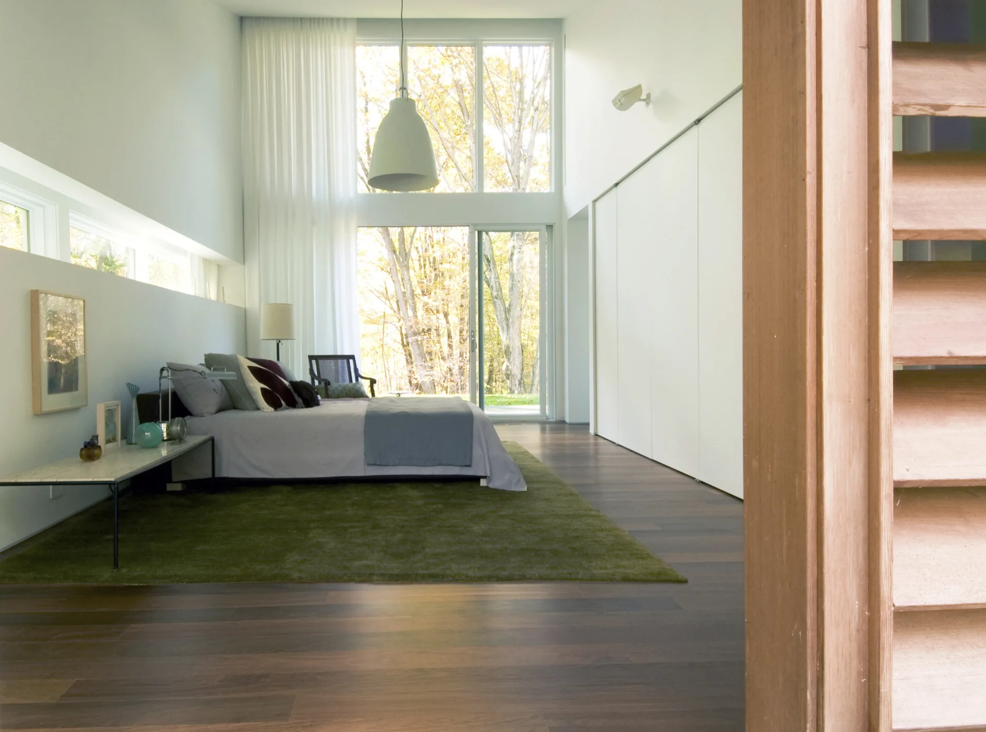 BEDROOM, green carpet, high ceiling, closets, windows
