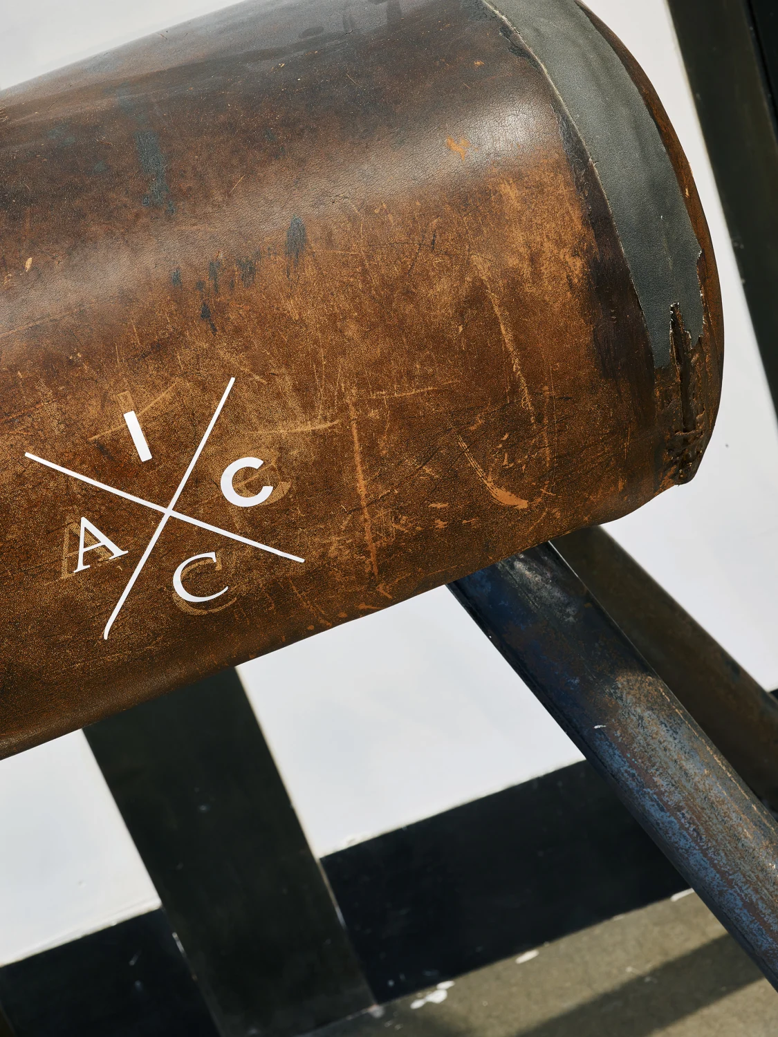 pommel horse, industry city, brown leather, metal