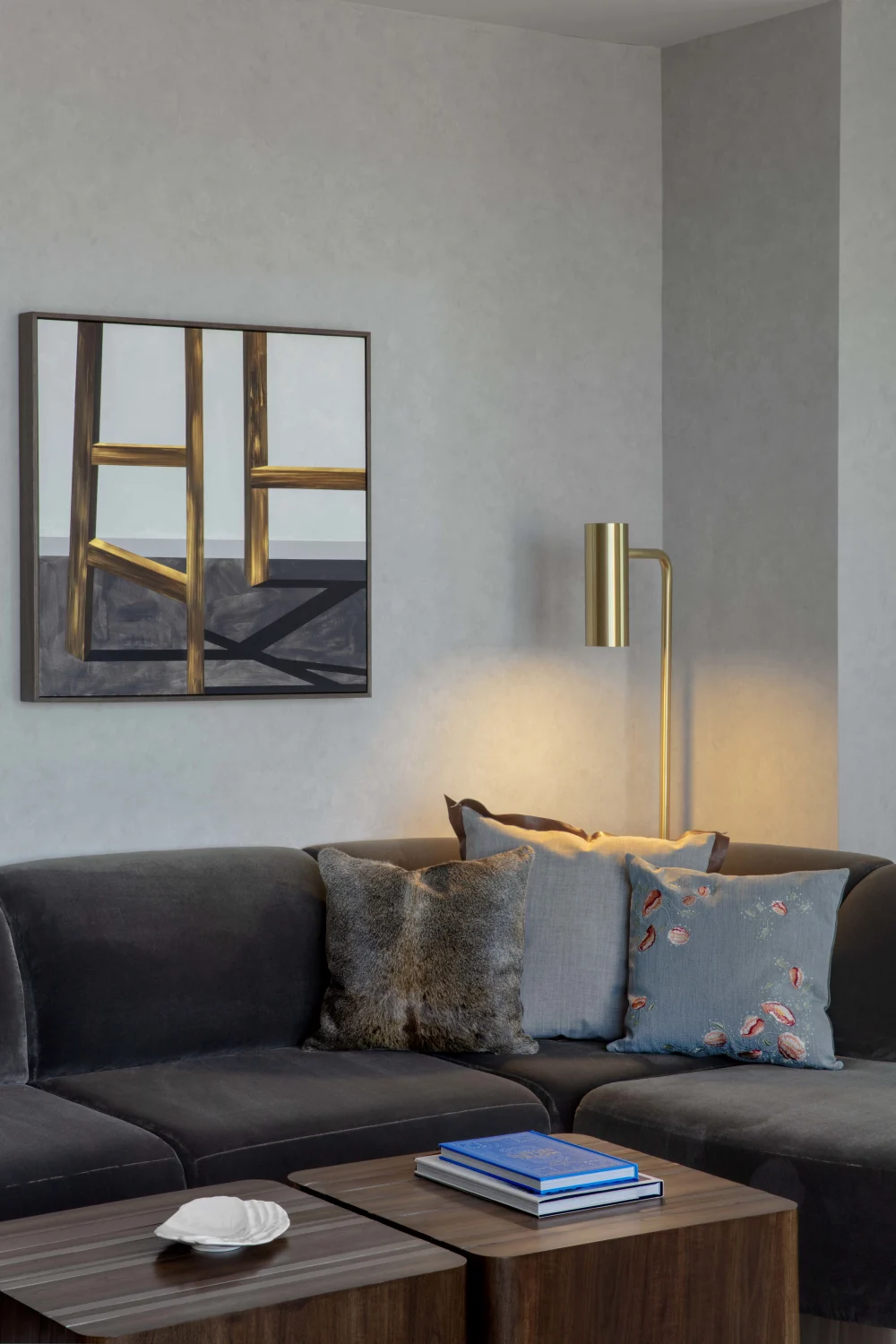 sectional, painting, coffee table, lamp