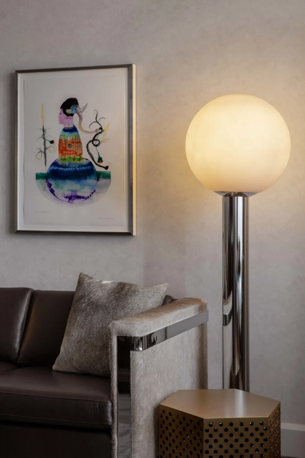 couch, lamp, side table, art