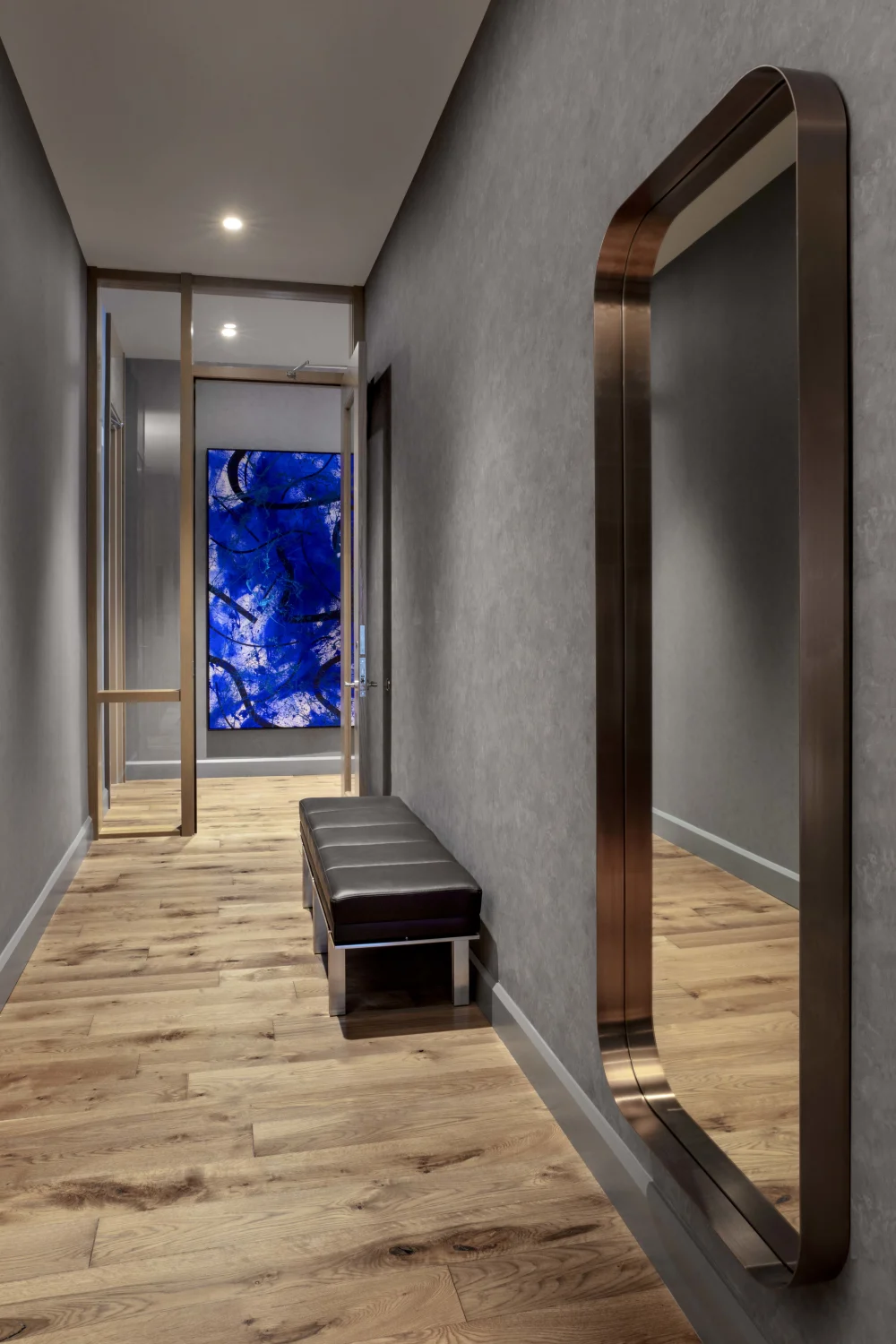 hallway, mirror, wood flooring, bench