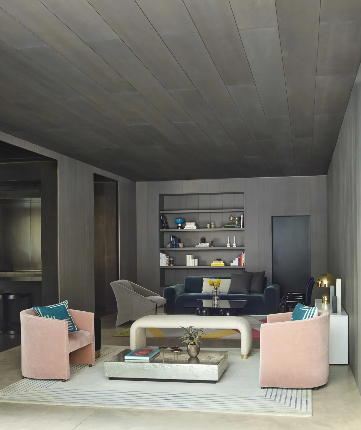 wood, seating area, rugs, bookshelf,