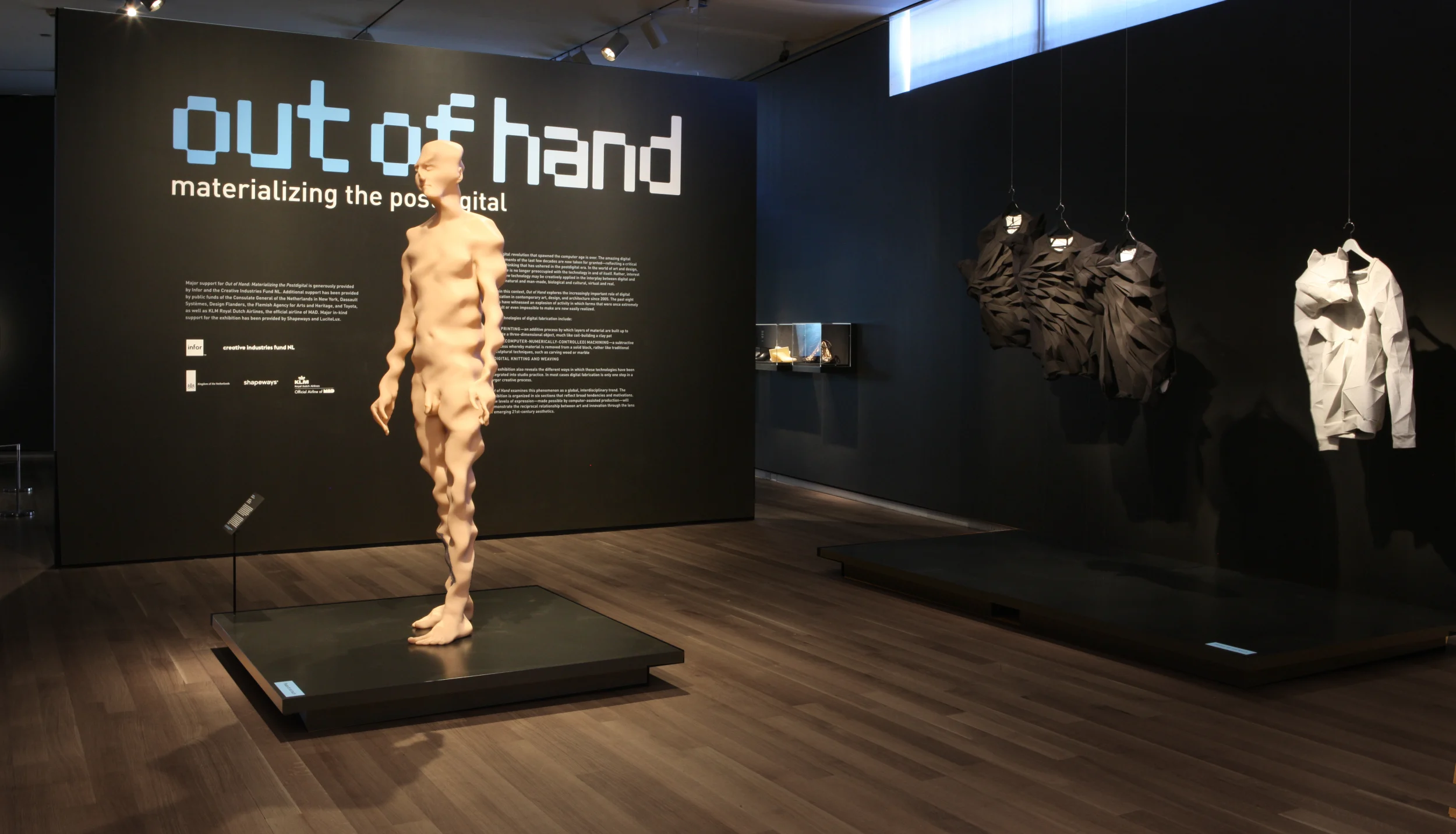 sculpture, human, clothing, description
