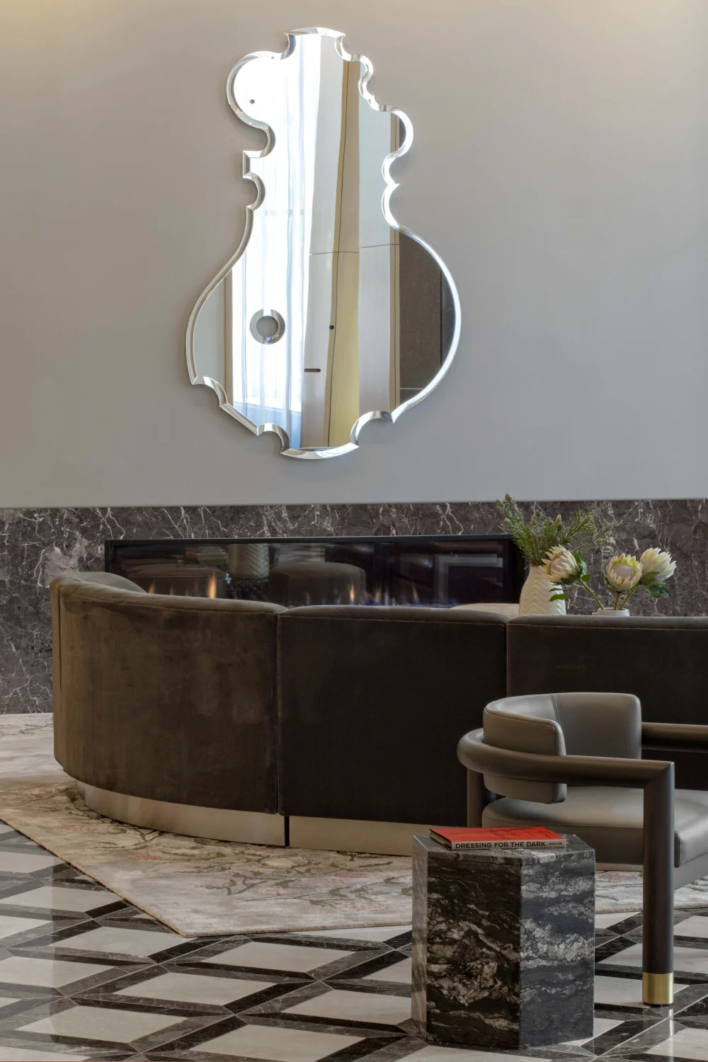 Mirror, seating area, fireplace, sofa