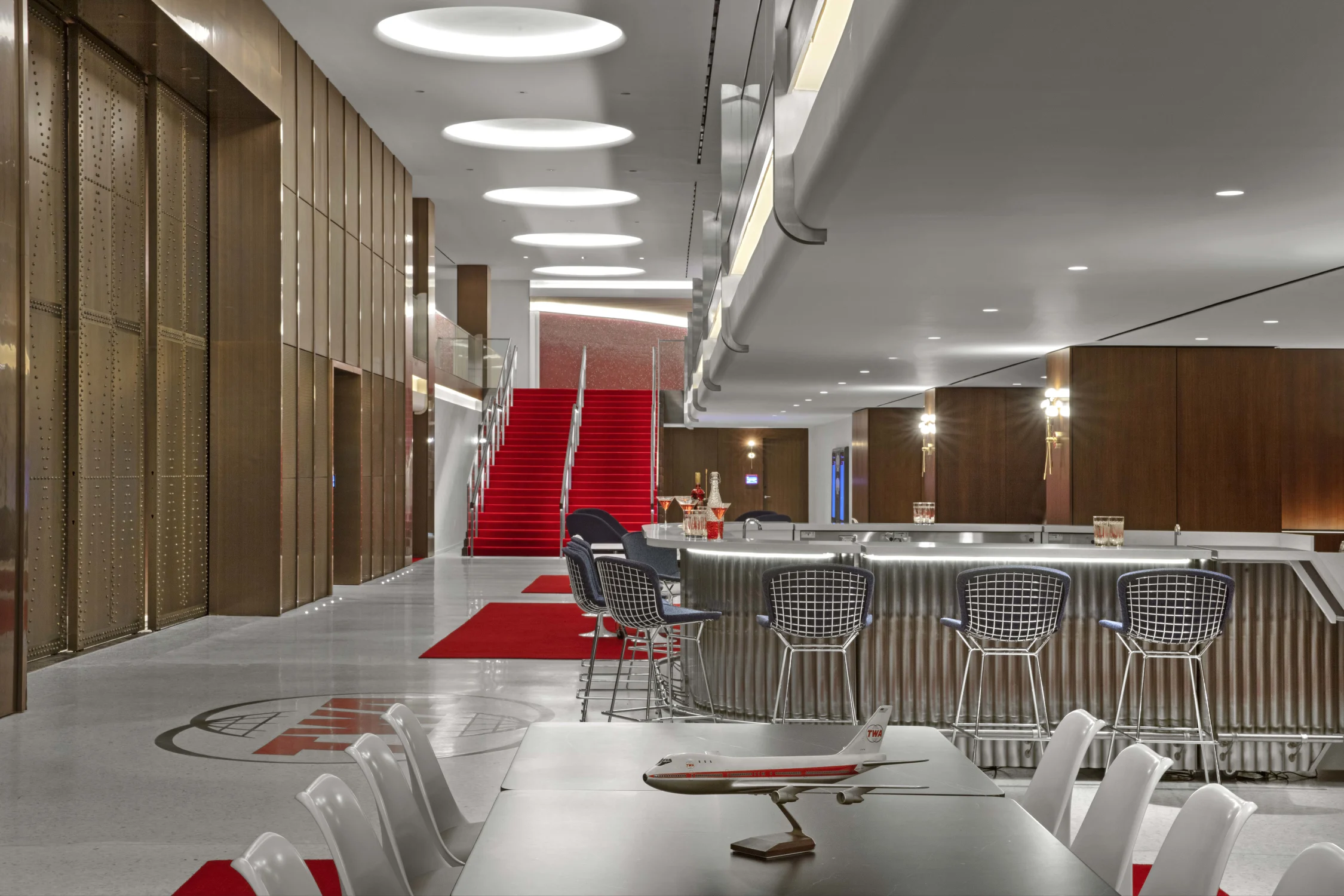 seating area, table, bar, staircase