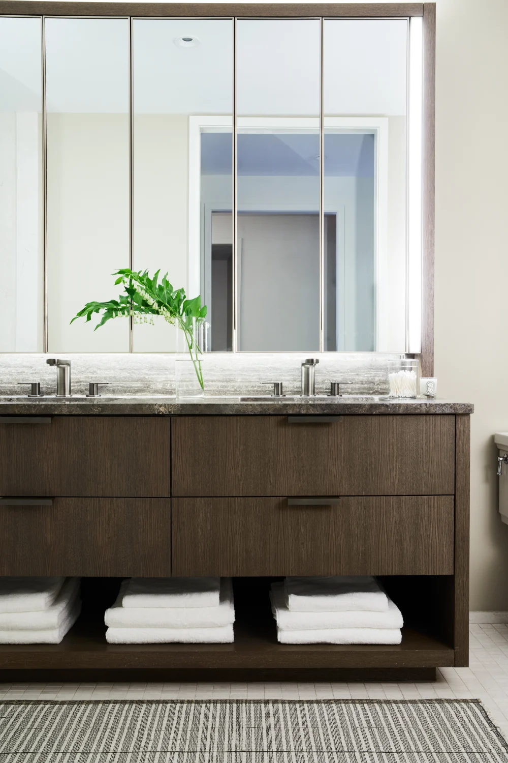 bathroom, wood, sinks, mirrors, plant, mat, towels, lights