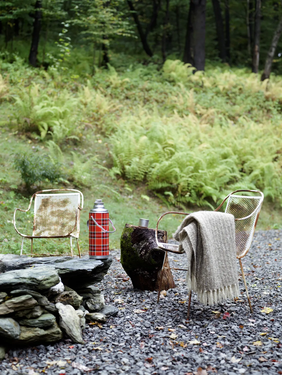 seating area, firepit, metal chairs, rock path