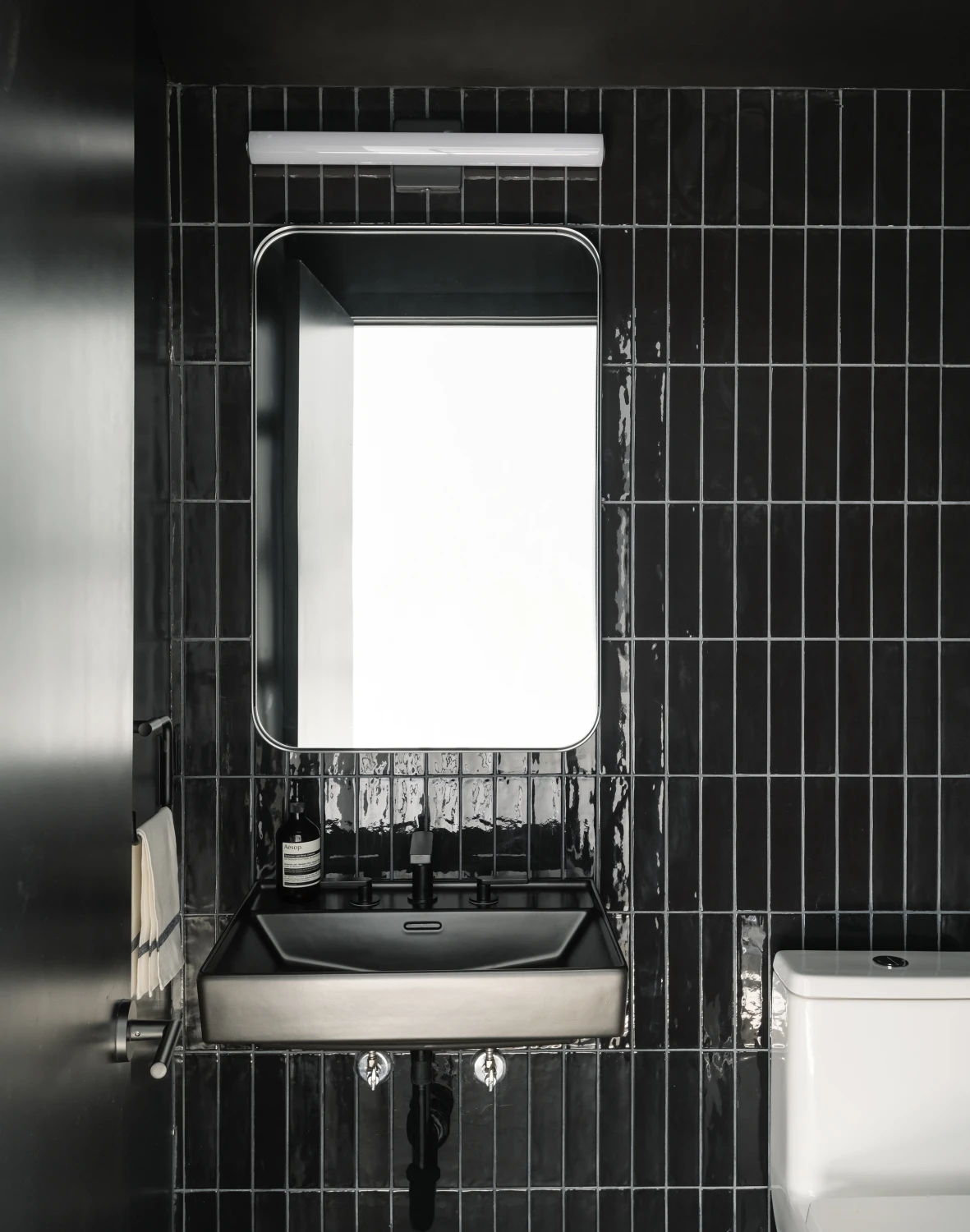 bathroom, dark tile, sleek, sink