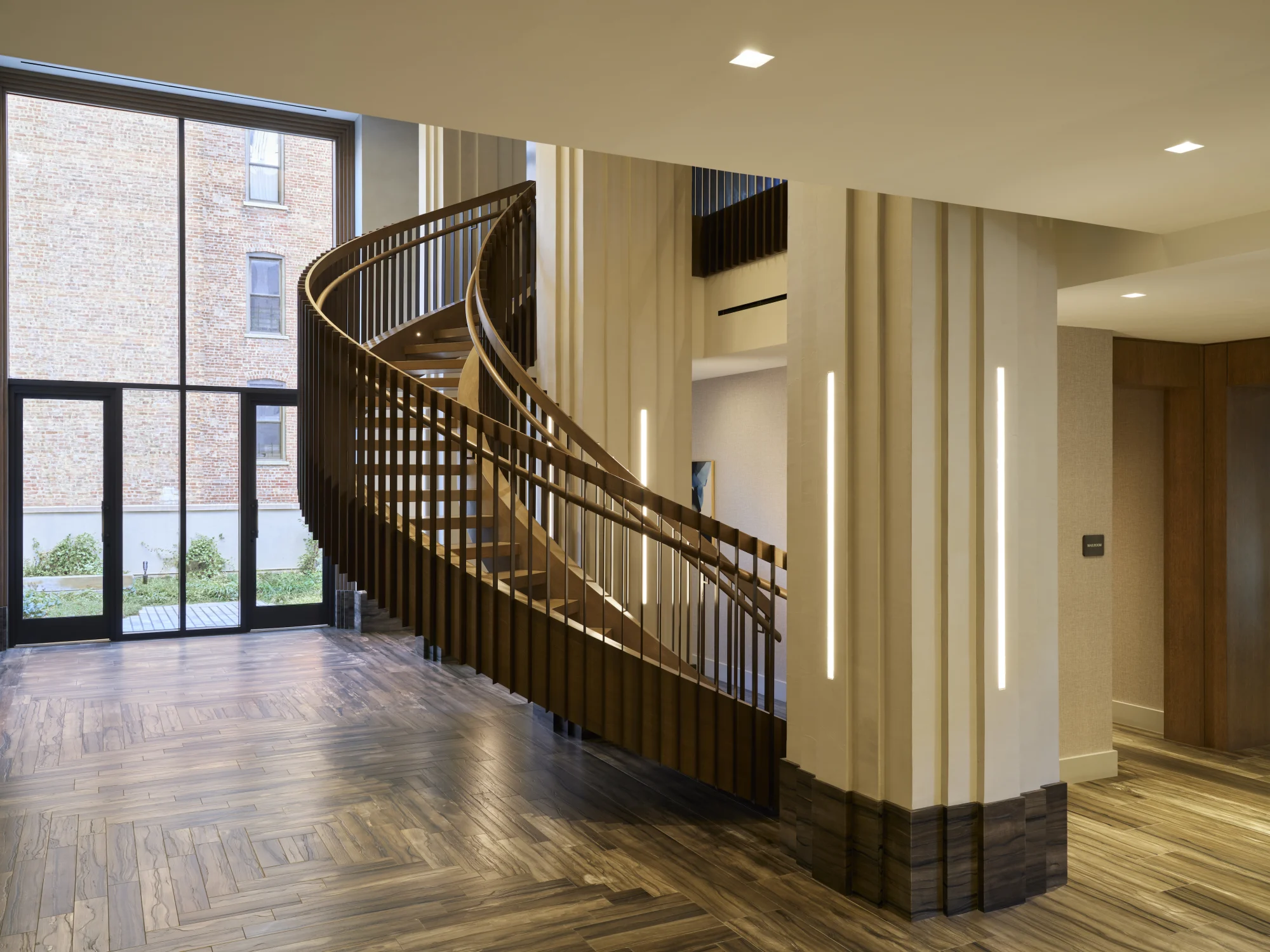 stair, wood, curved staircase, wood railing, columns, wood flooring, double height space, glazing, outside terrace,