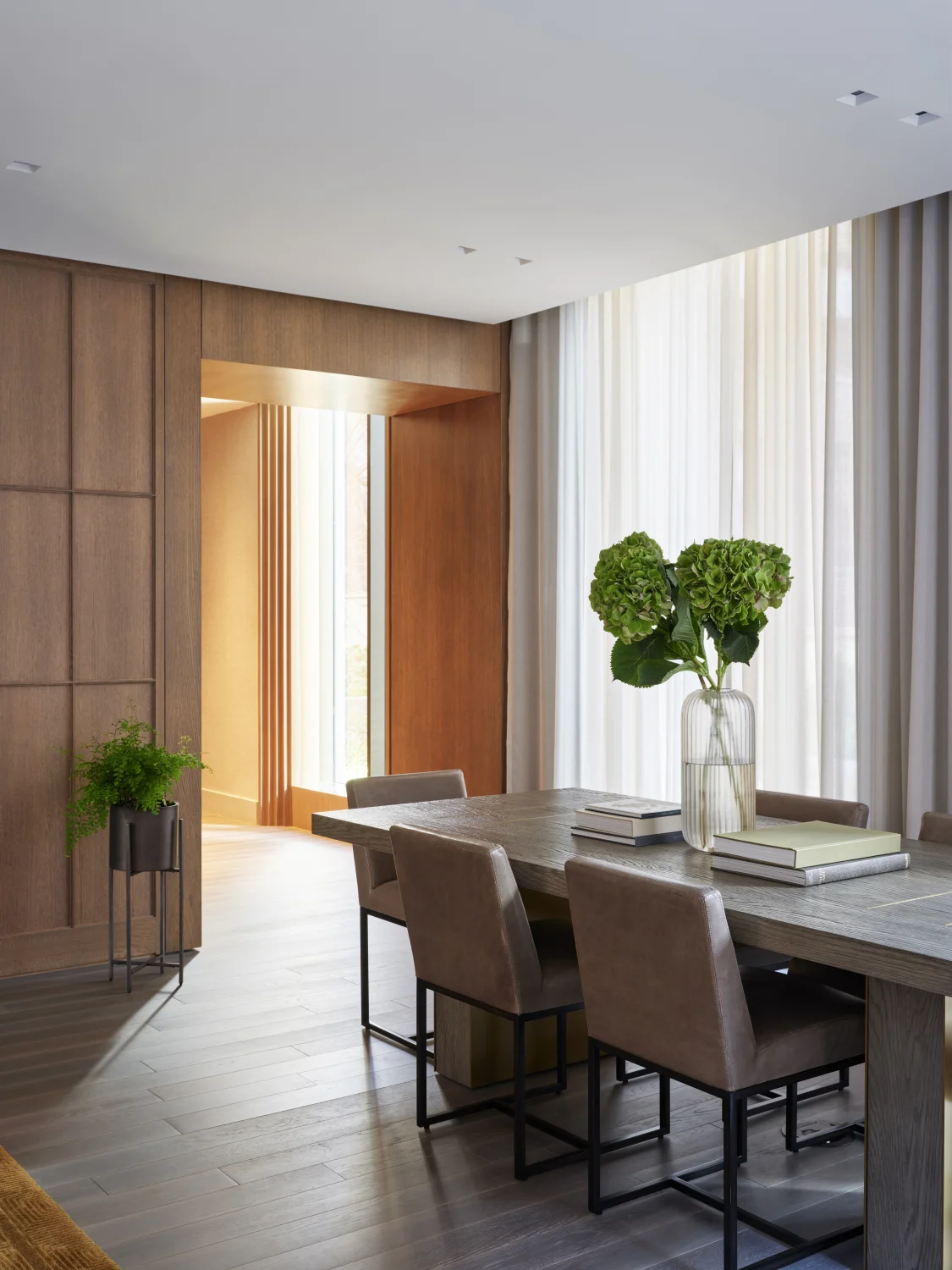 dining, table, chairs, wood, planter, drapery, wood flooring, vase, book, natural light