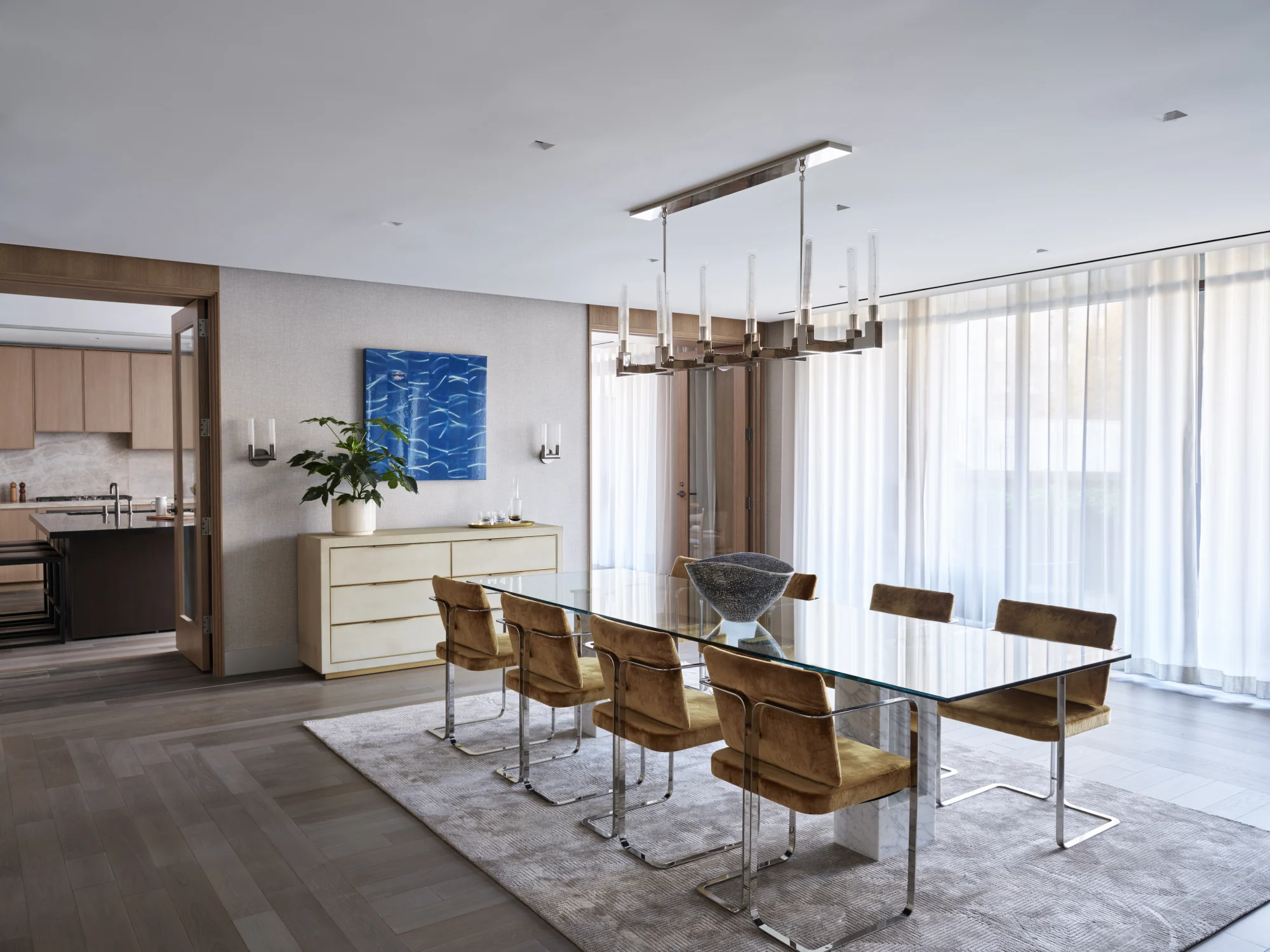 dining, table, chandelier, chair, velvet, rug, stainless steel, sleek, wood, art, dresser, planter, kitchen entrance, lighting, drapery, glass