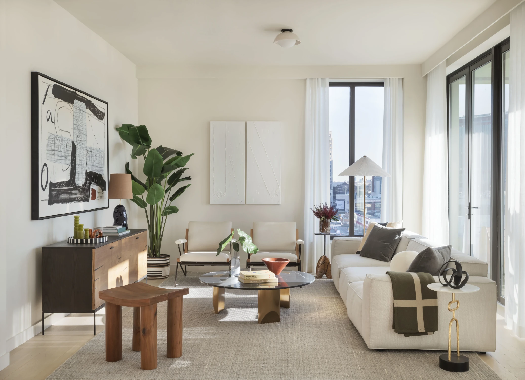 living room, sofa, coffee table, art, chair
