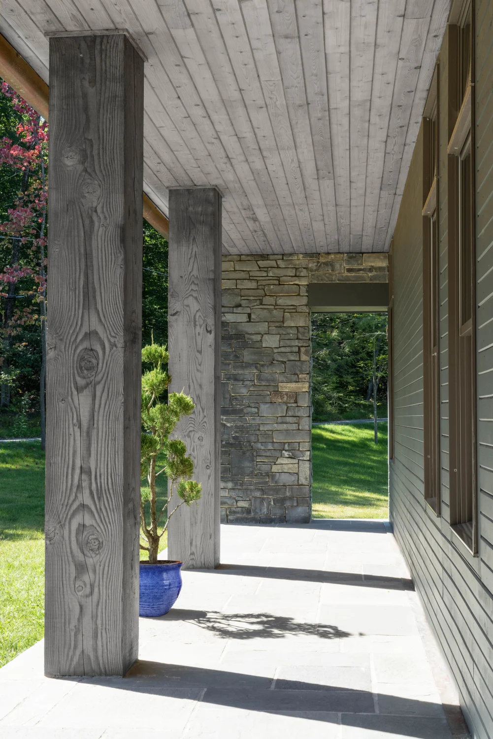 porch, columns, masonry, stone, pavers, wood, planter, doorway