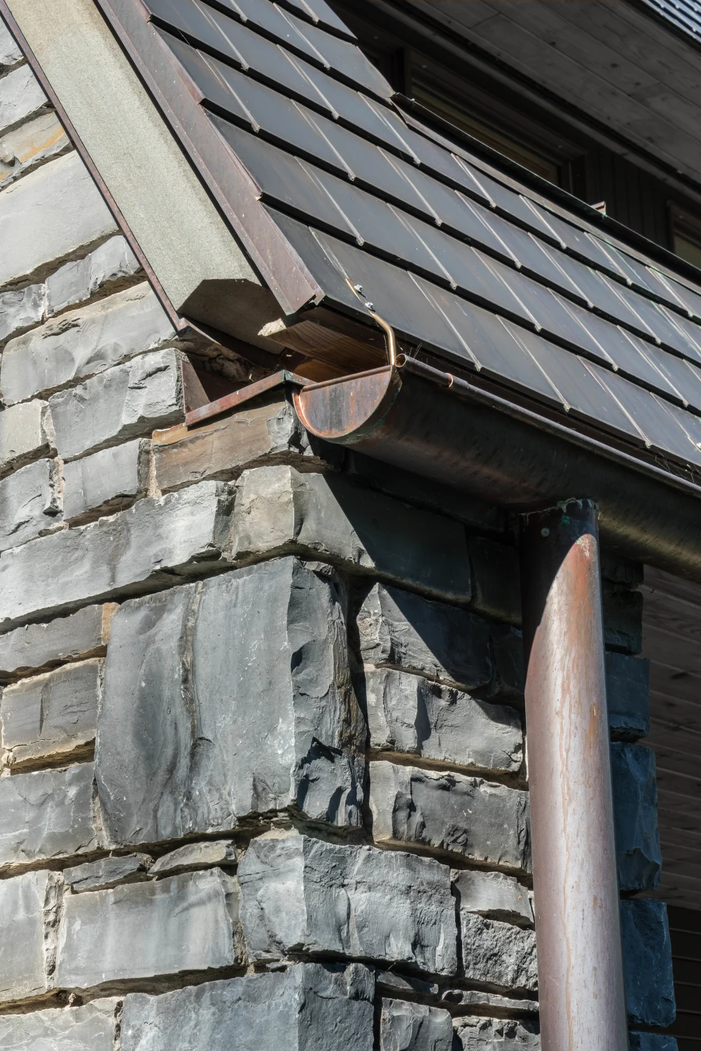 masonry, stone, copper, shingles, downspout, drainage detail