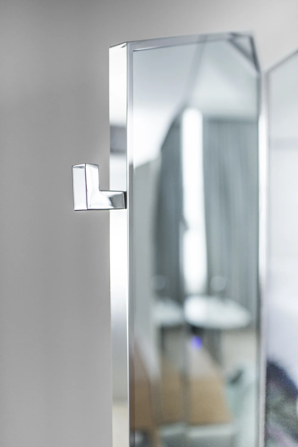 LOCATION, DETAIL, HOOK, MIRROR, FACETED, BACK LIT, METAL, FRAME, FOLDING
