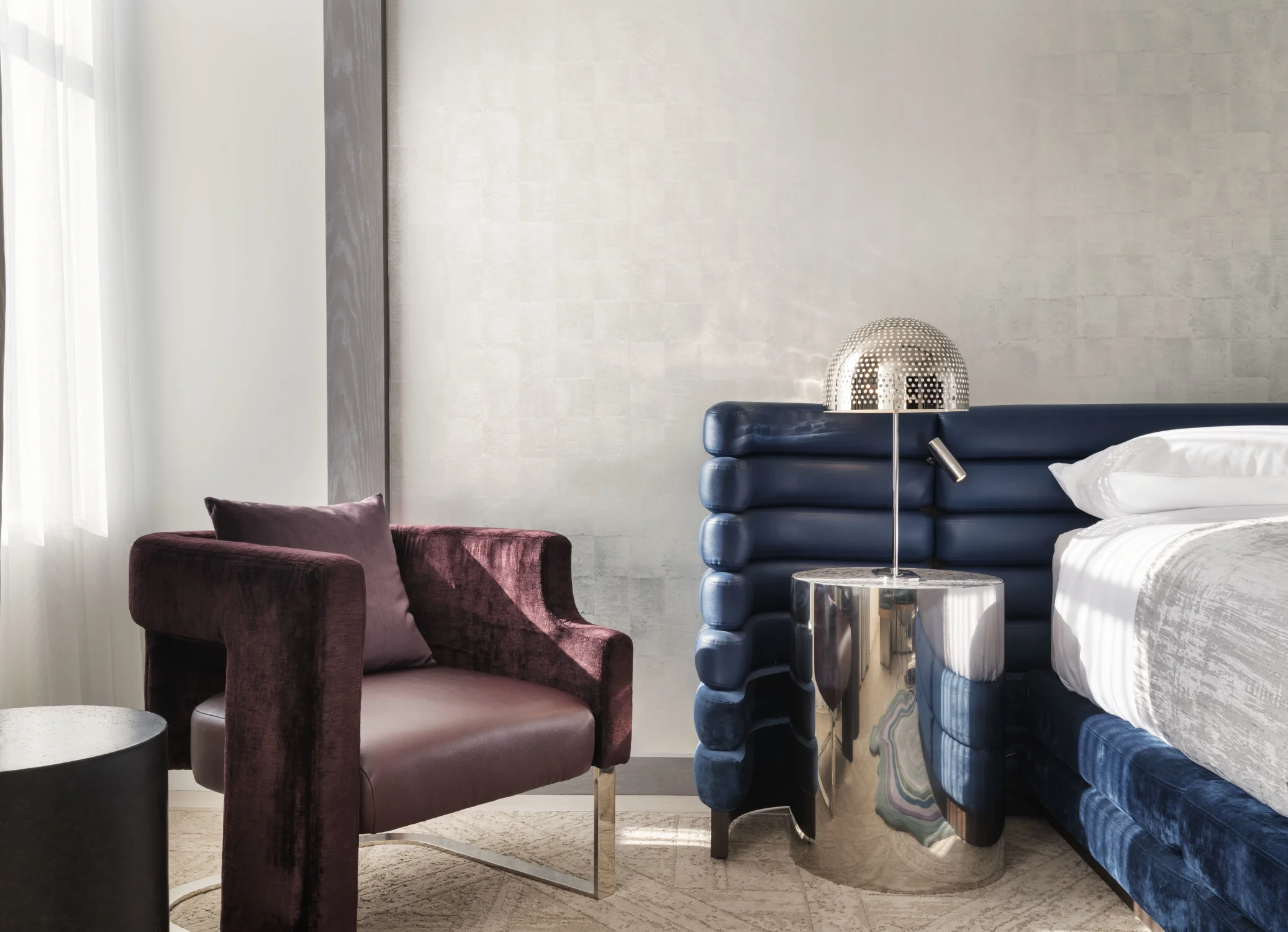 lounge chair, silver leaf, blue, channel tuft, chrome sidetable, perforated