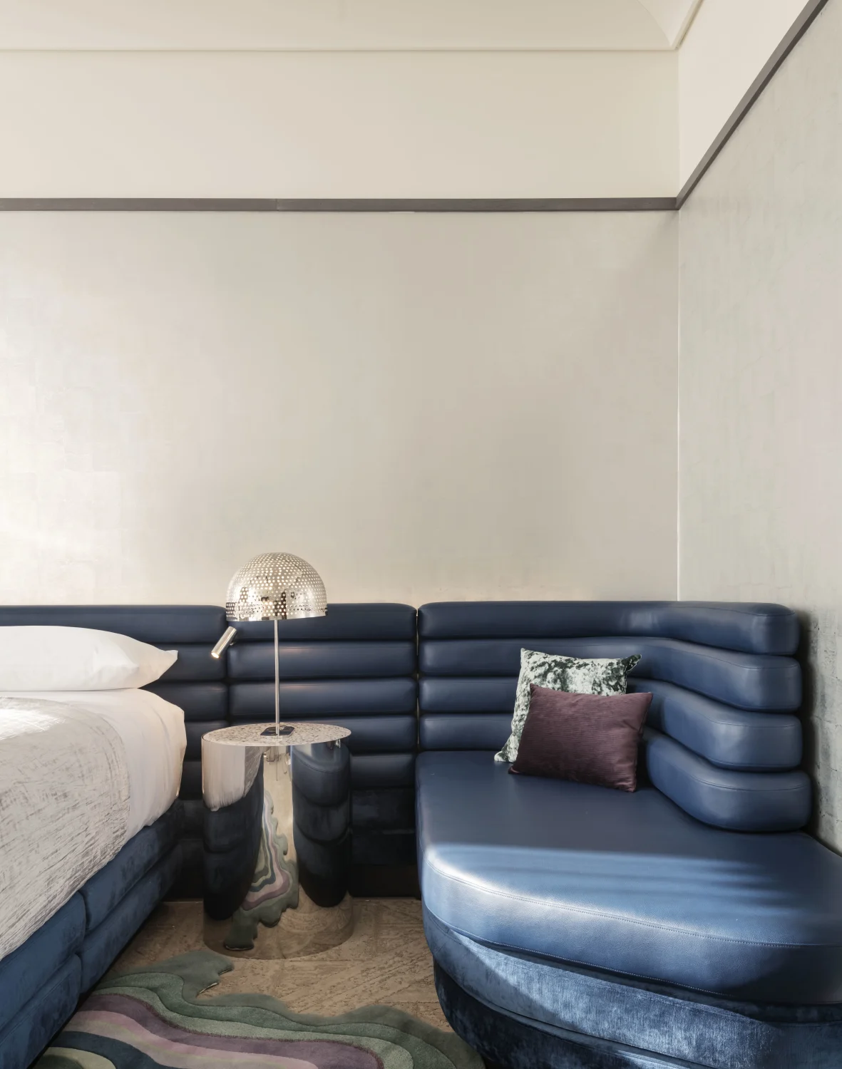 silver leaf, blue, channel tuft, chrome sidetable, perforated lamp, bedroom