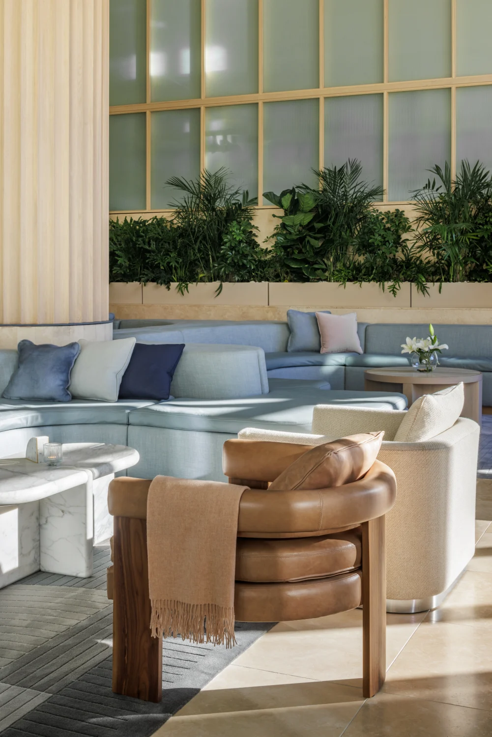 Seating, chair, sofa, plants, leather, cushions, flowers, glass, rugs