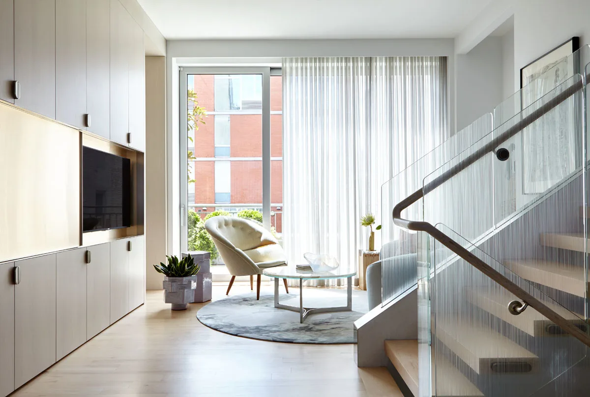 TV, stairs, windows, cabinets, chair, carpet, glass, curtains, plants, coffee table