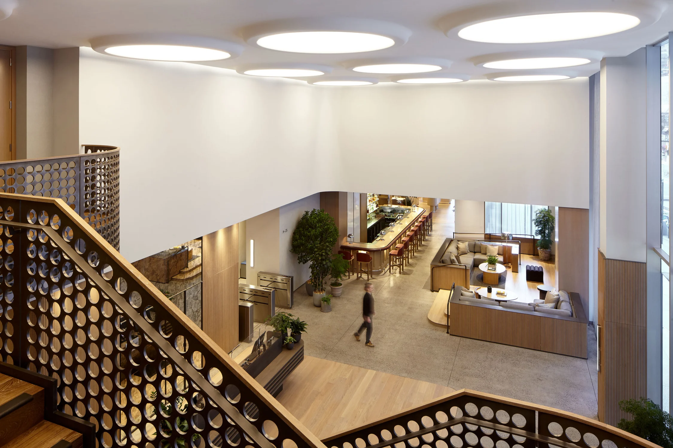 stairs, bar, lounge, lobby, plants, wood, concrete, tiles, bar stools, sofa