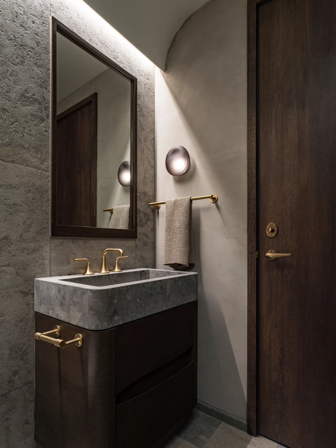Bathroom, sink, lighting, stone, wood, brass, mirror, gray, tiles