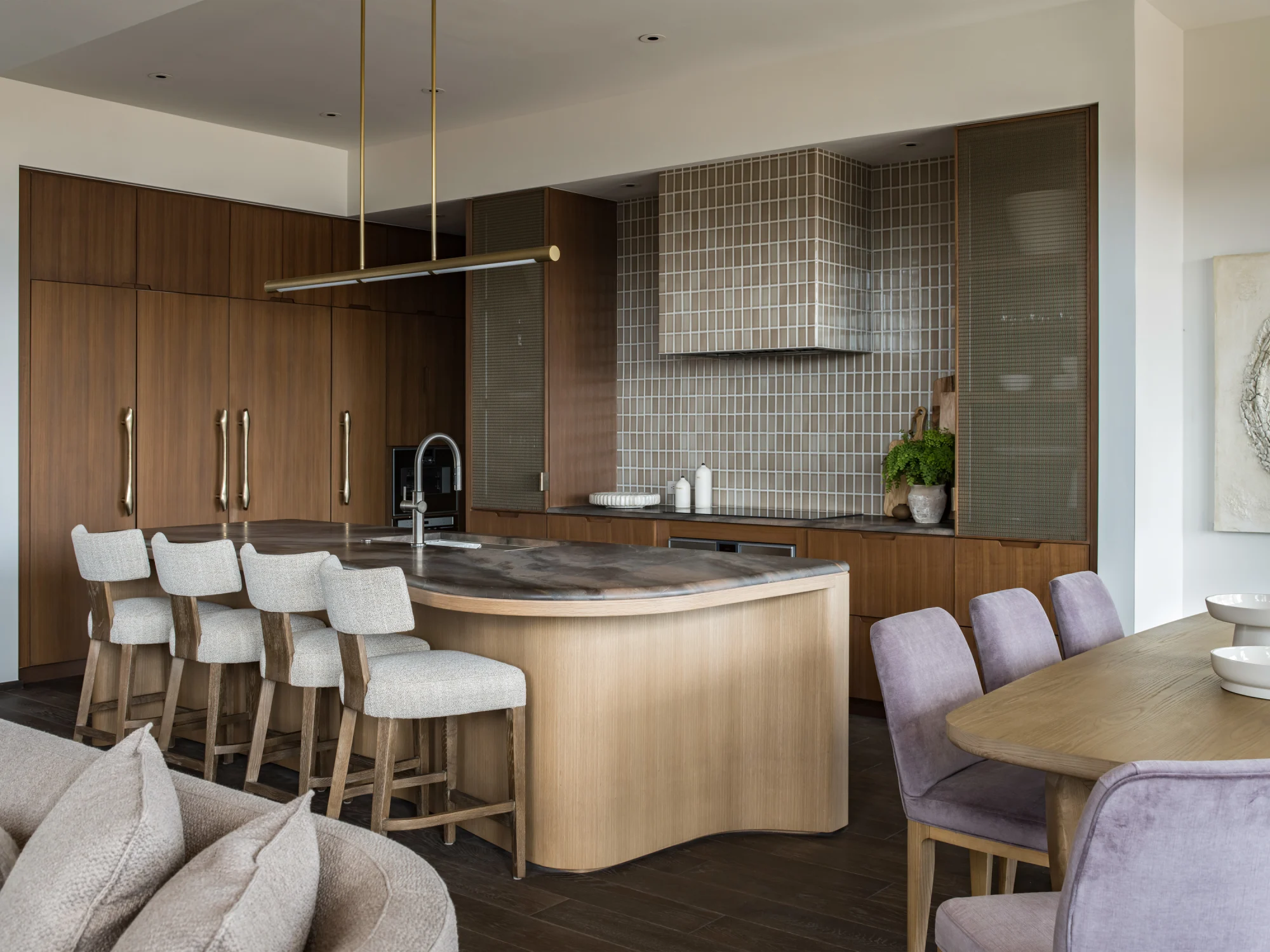 Kitchen, wood, hanging lights, island, glazed tiles, dining area, wood flooring, stone countertop, brass