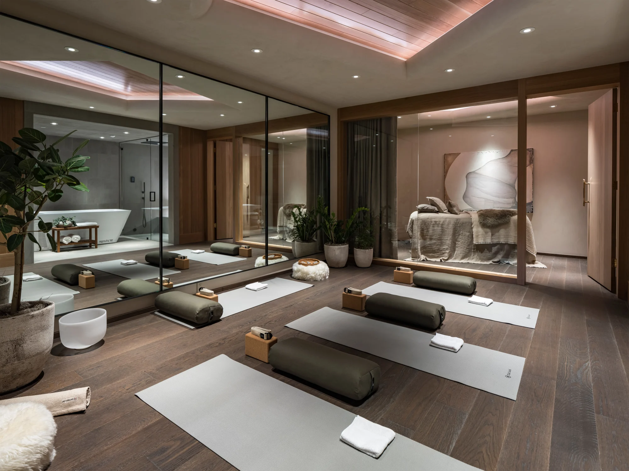 spa, lighting, wood flooring, planter, bathtub, towels, art, mat