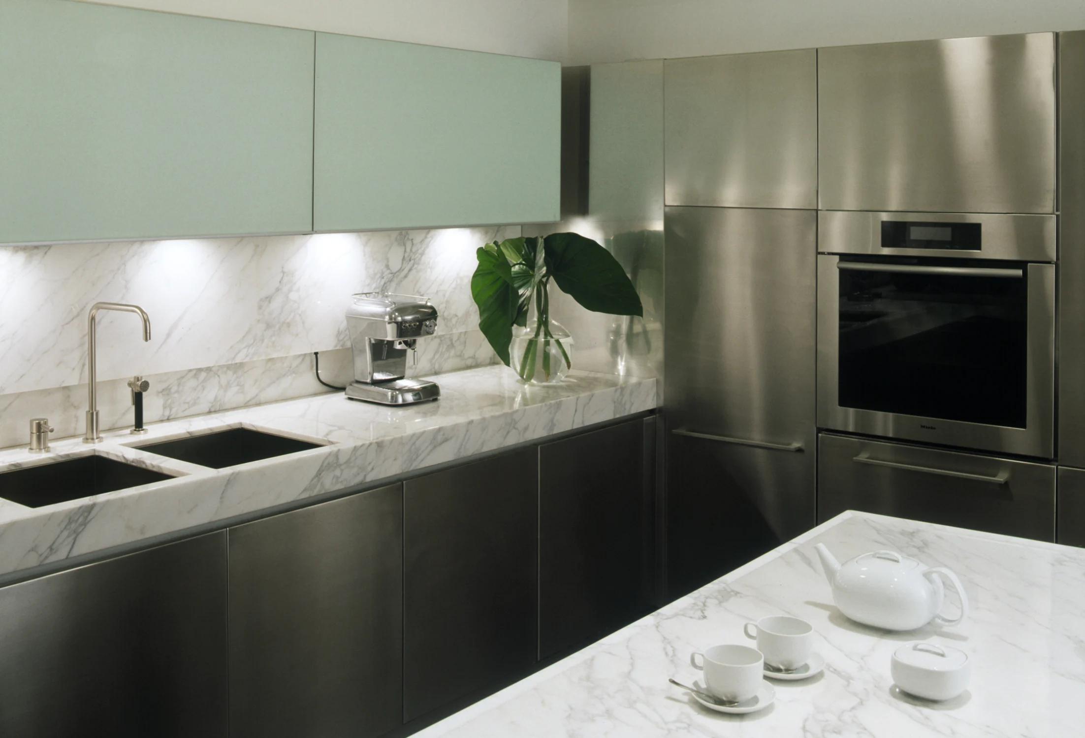 laight apartment kitchen 2 marble, steel, cabinets, tea set