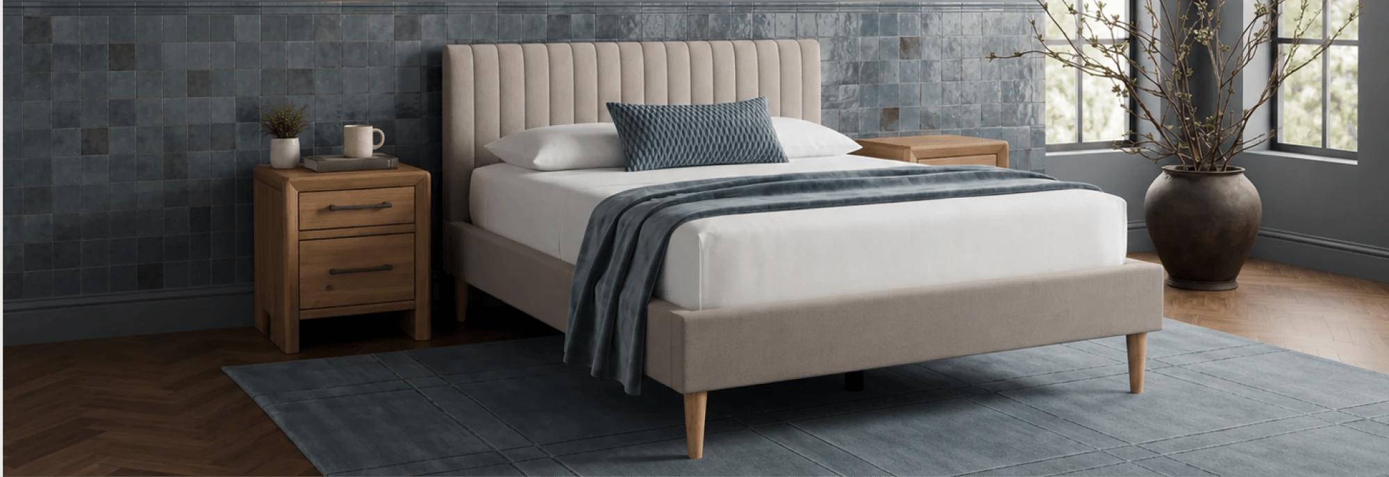 upholstered bed in blue room