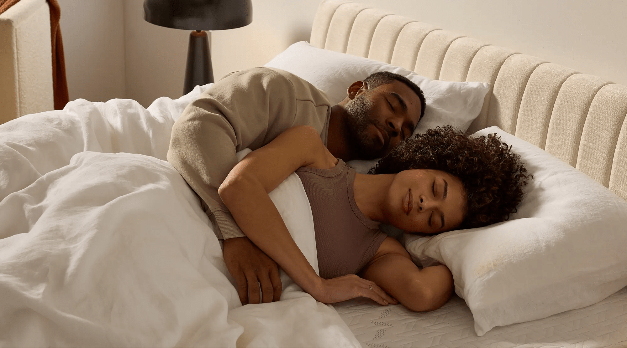 couple sleeping deeply on a Nectar mattress