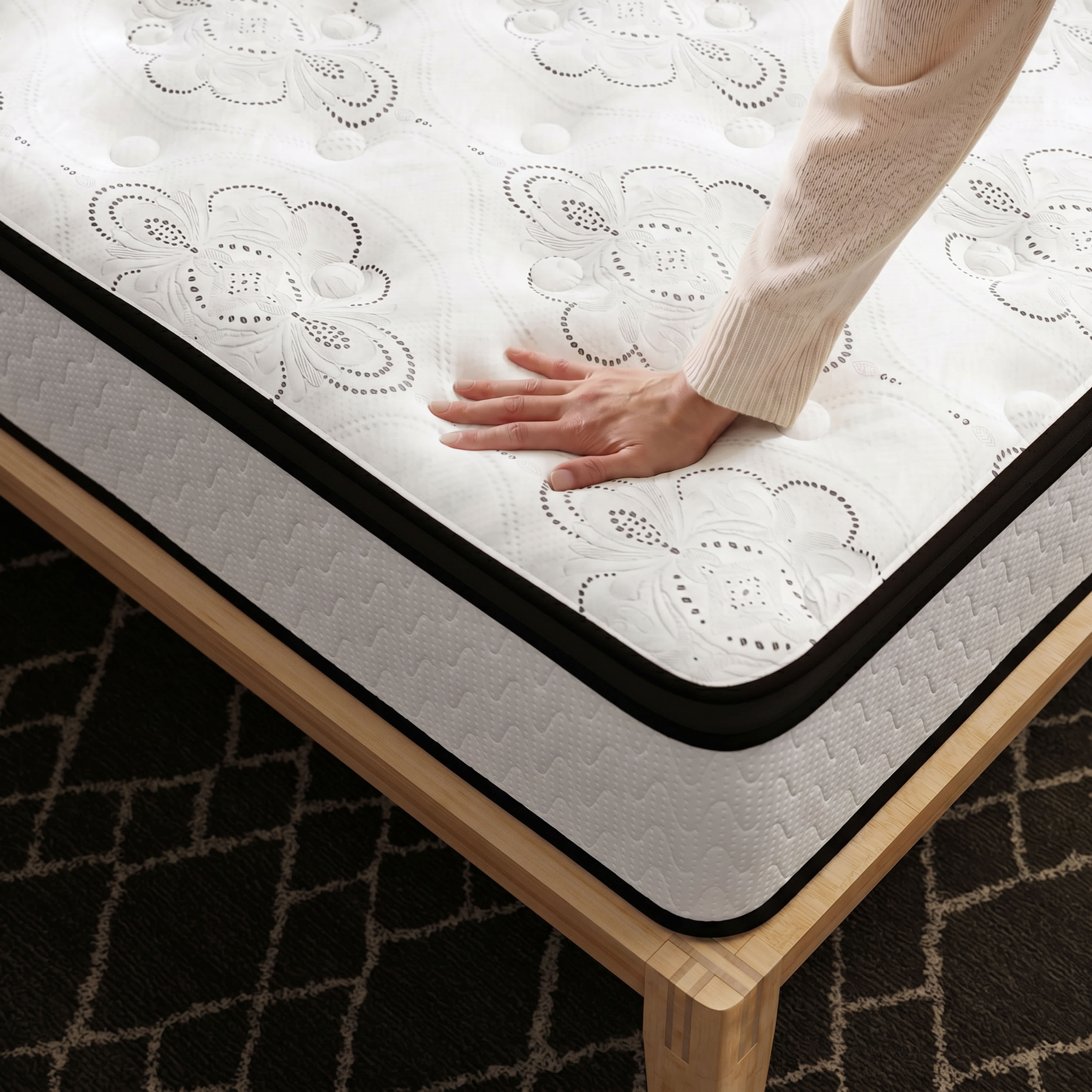 Handing pressing onto a mattress