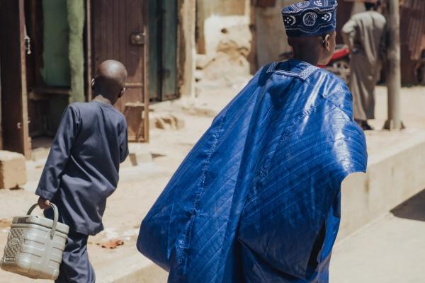 Emir's guards leading riders with ceremonial spears
