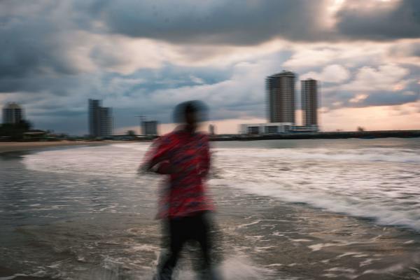 Sunrise washing over Tarkwa Beach shoreline in Lagos