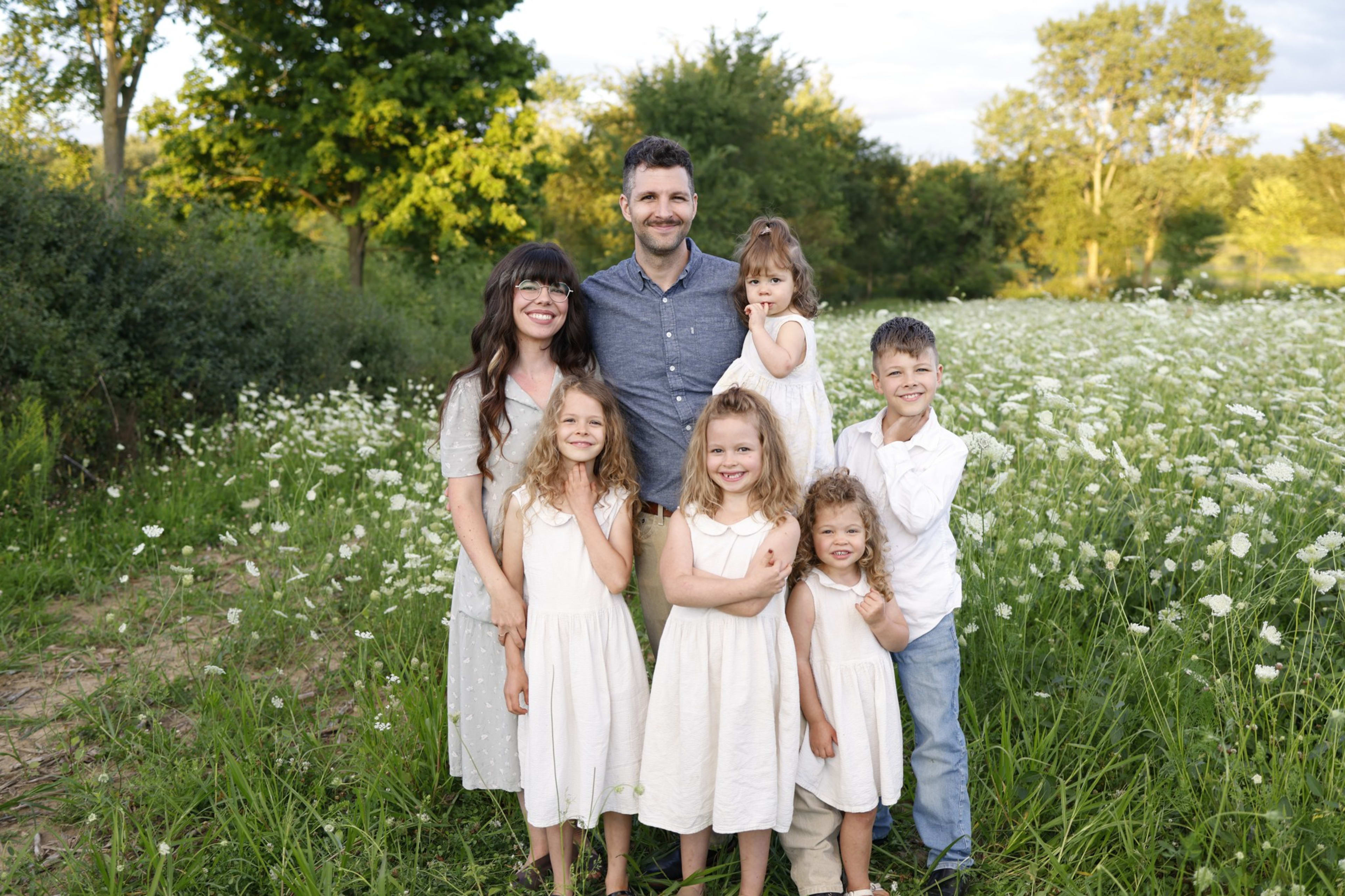 Parsons family of six in a wildflower field, natural-light Detroit family session