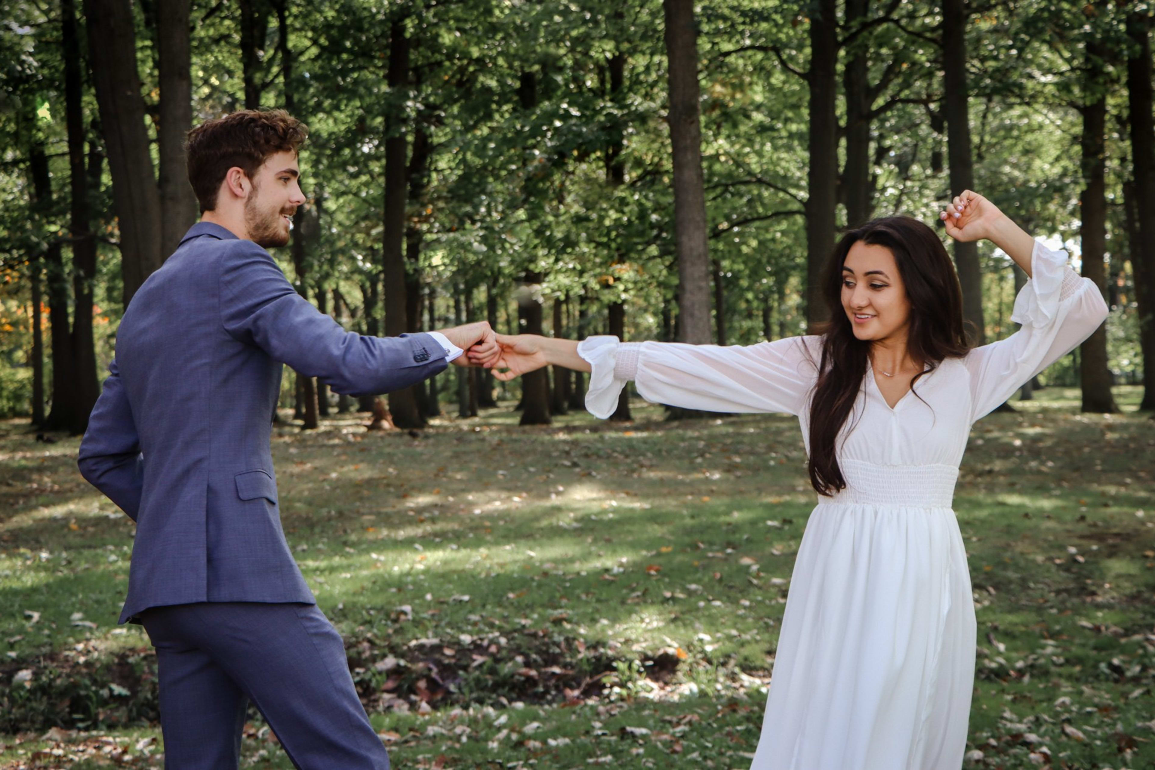 Bride and groom dancing among the trees, Metro Detroit wedding photography