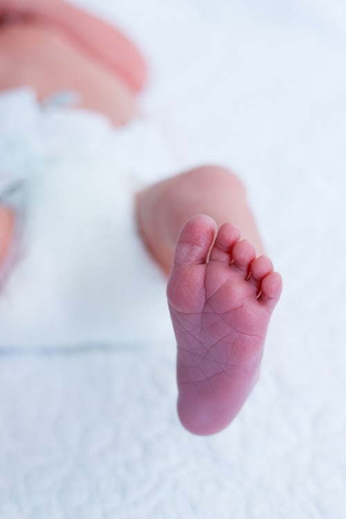 Close-up of a newborn's tiny foot, Metro Detroit newborn details