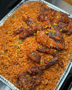 jollof rice and sauce chicken